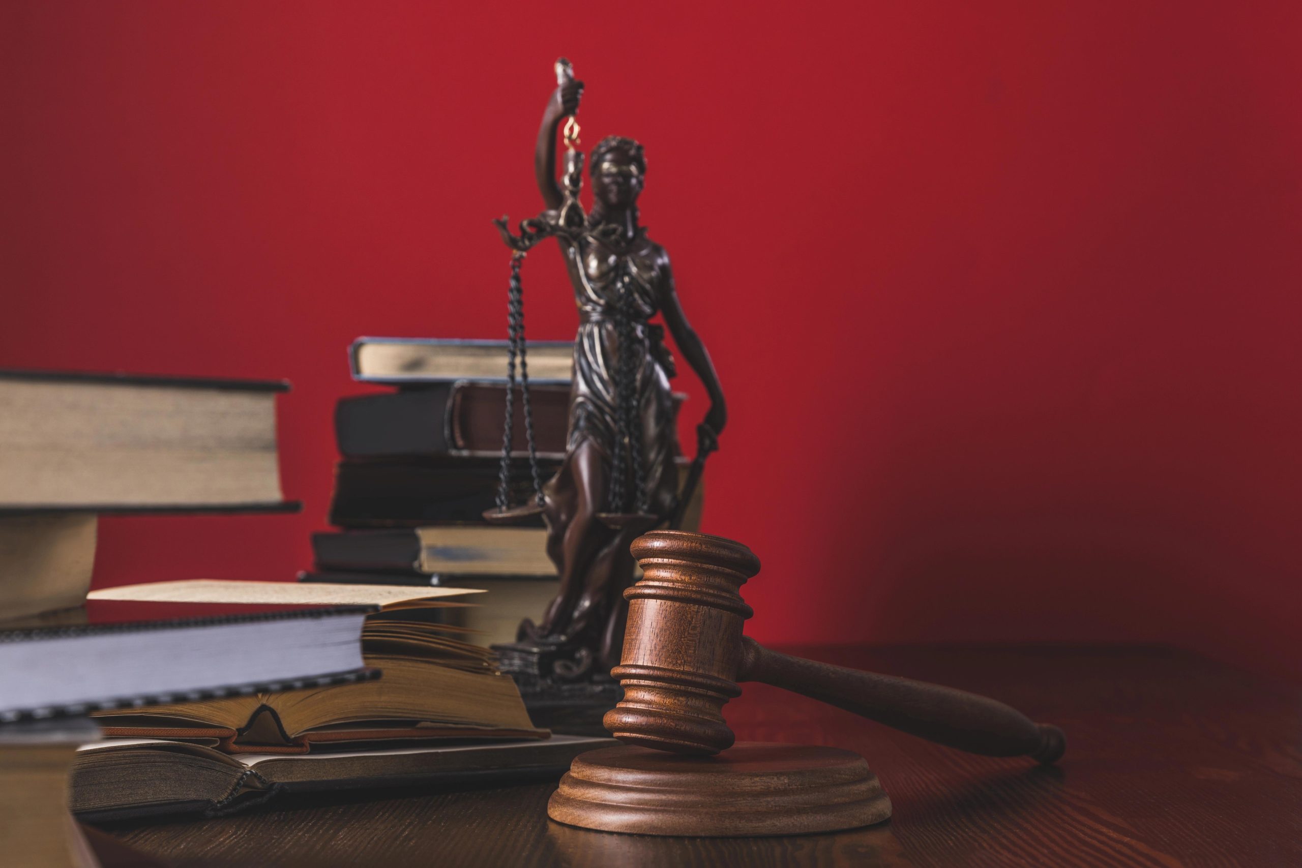 Opened Juridical Books Lady Justice